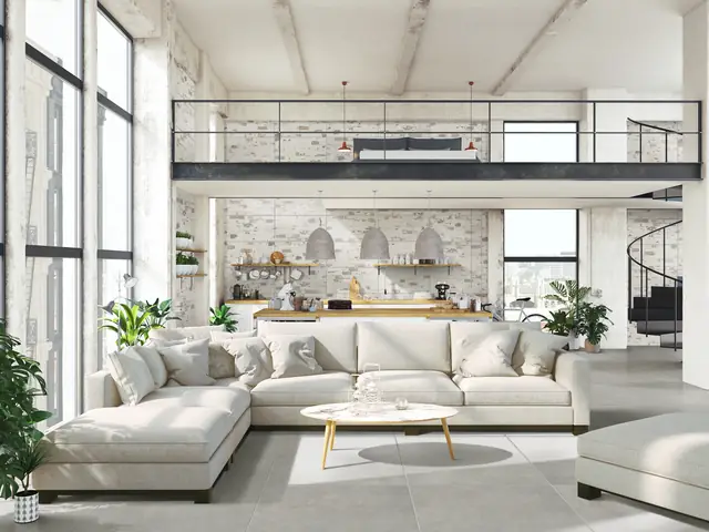 Loft con pavimento in gres porcellanato grigio, esempio di piastrelle in offerta